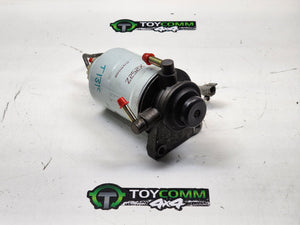 May 1990 to Mar 1998 - Toyota Land Cruiser 80 Series Diesel Turbocharged 4.2L Engine Code 1HD - Fuel Filter Housing - Hand Primer Pump