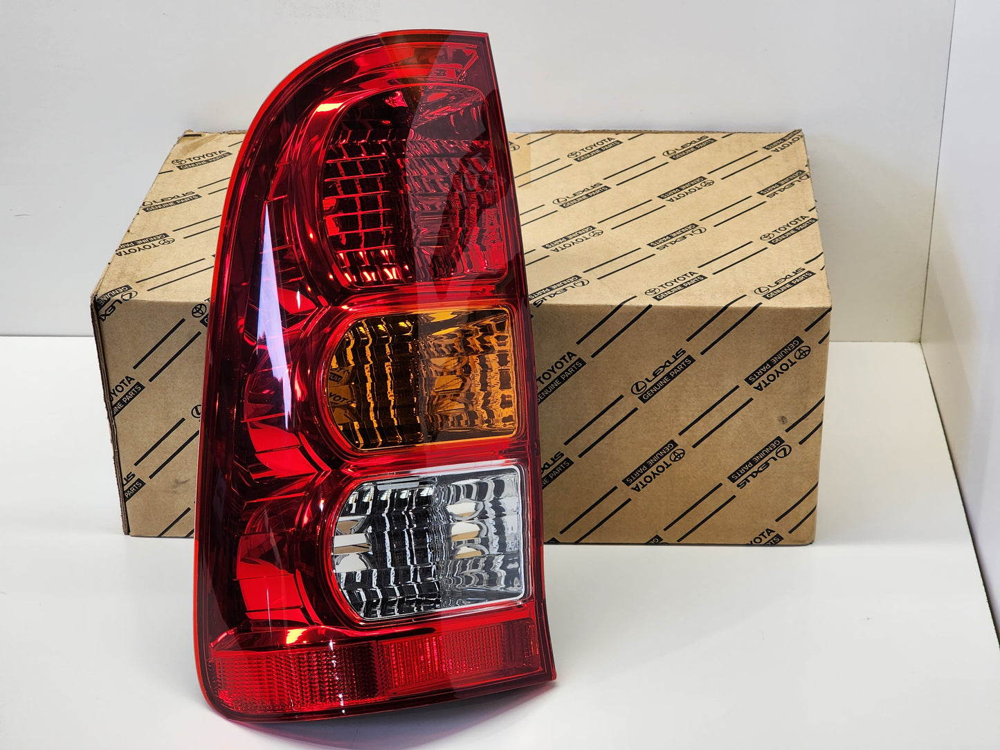 Tail Light to suit Hilux 2005 - 2011 LH Side (New Genuine)