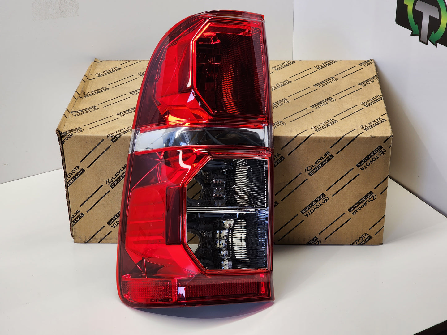 Tail Light to suit Hilux 2011 - 2015 LH Side (New Genuine)